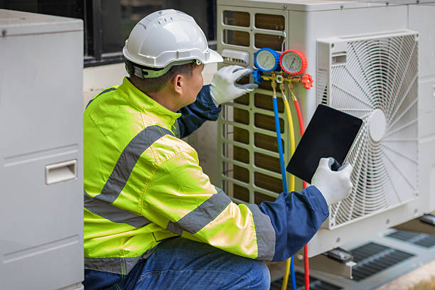 Professional Air Conditioning Repair technician working in Mendon, MA